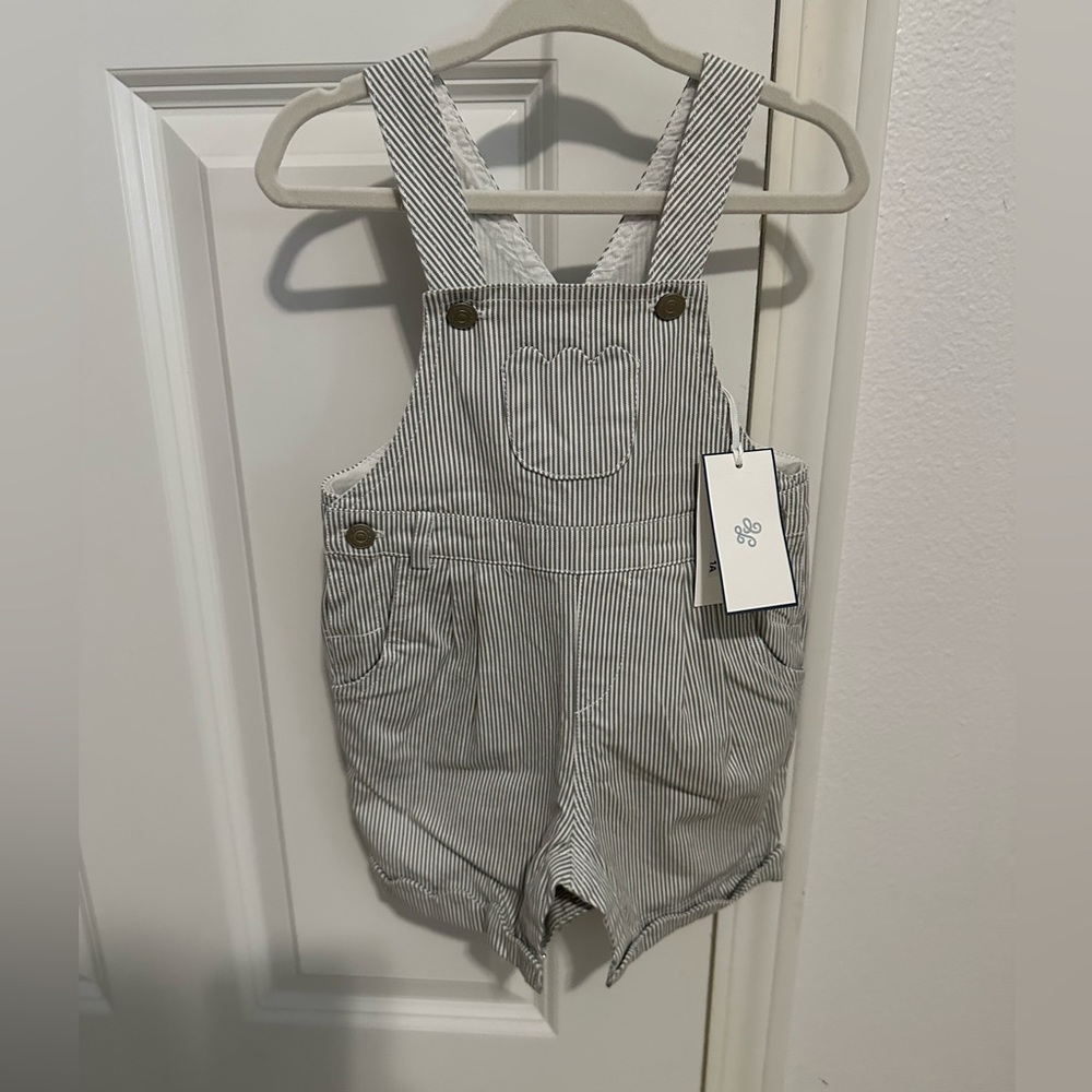 Tartine et Chocolat Striped Overall (jumpsuit) stripes. I believe it’s unisex.